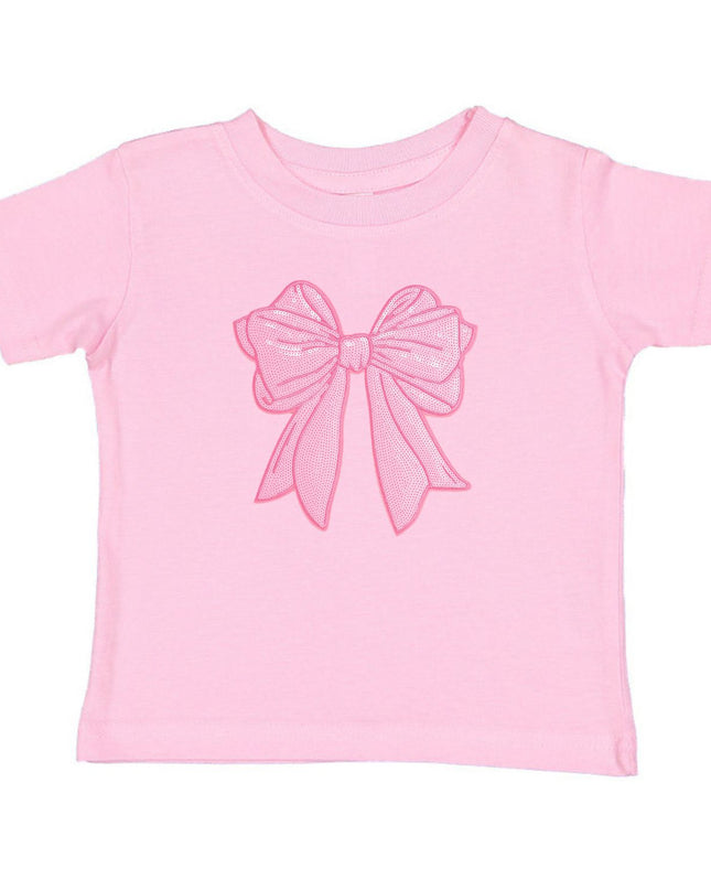 Pink t-shirt with oversized sequin bow patch