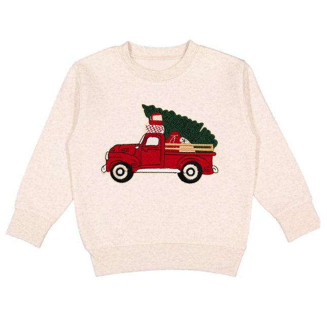 Natural color sweatshirt with red truck carrying a Christmas tree patch