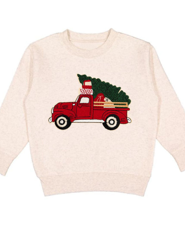 Natural color sweatshirt with red truck carrying a Christmas tree patch