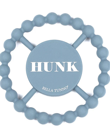Blue silicone baby teether with the text 'hunk'