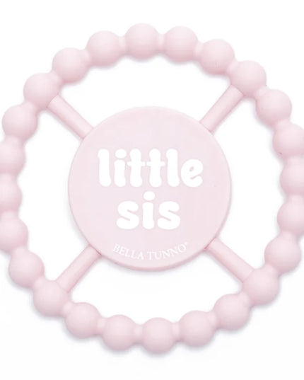 Light pink teething ring with 'little sis' text
