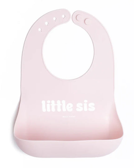 Pink baby bib with 'little sis' text 