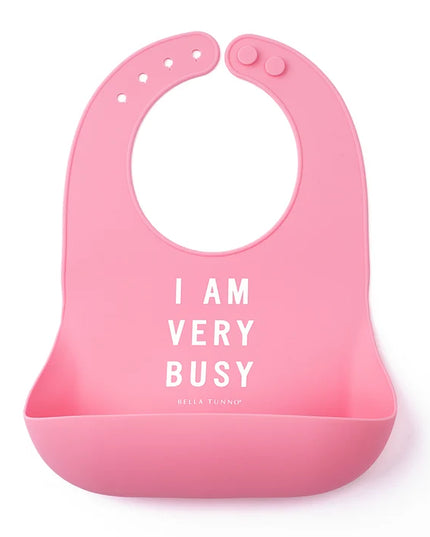 Pink bib with 'I am very busy" text