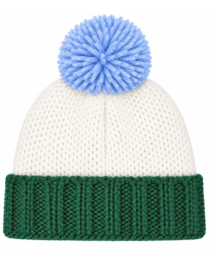 A knit winter beanie hat with a cream-colored body, a dark green ribbed cuff, and a light blue pom-pom on top