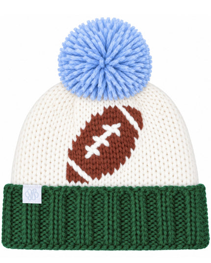 A knit beanie hat with a light blue pom-pom, an off-white knit body, a brown football graphic and a dark green ribbed cuff. 