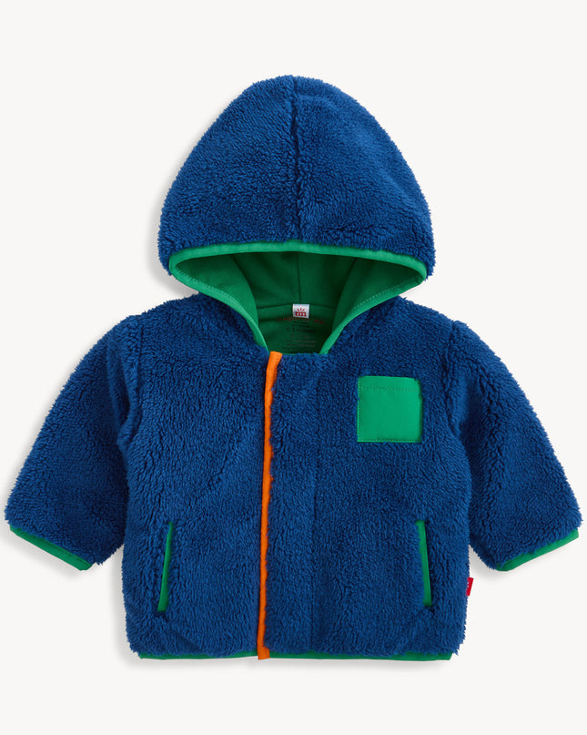 Blue hooded sherpa jacket with green and orange accents